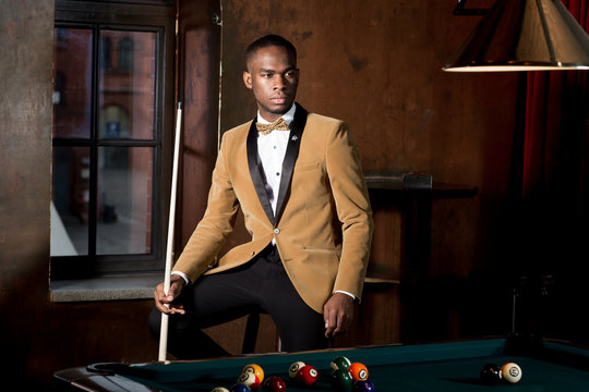 Handsom Man playing Billiard