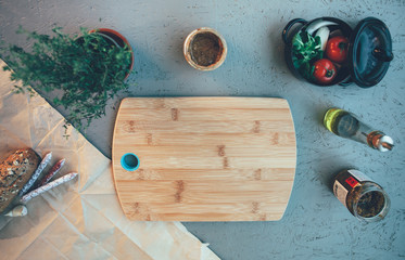 high angle view of a chopping board on a table with food