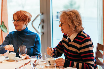 Two Senior Women In A Restaurant