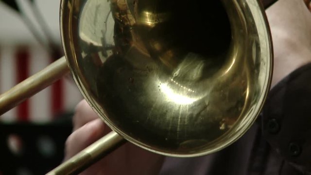 Jazzman playing trumpet close-up