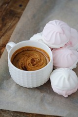 Fototapeta na wymiar Delicious marshmallow with strawberry creamy taste and coffee 