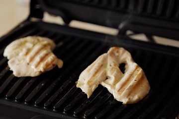 Fresh chicken fillet on the grill for dinner 