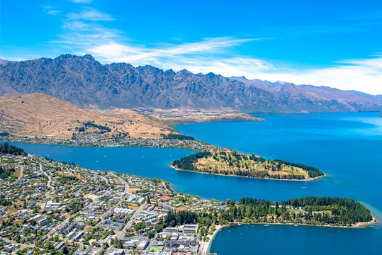The blue lake and clear sky with beautiful town view from Skyline Gondola, Queenstown, New Zealand