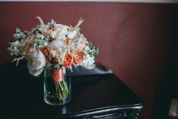 stylish beautiful bridal bouquet from different flowers