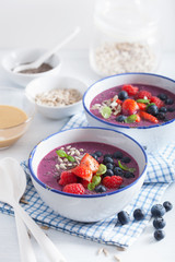 healthy berry smoothie bowl with strawberry blueberry raspberry and chia seed