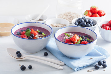 healthy berry smoothie bowl with strawberry blueberry raspberry and chia seed