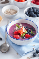 healthy berry smoothie bowl with strawberry blueberry raspberry and chia seed