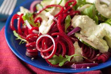 spiralized beet and cucumber salad with avocado dressing, healthy vegan meal