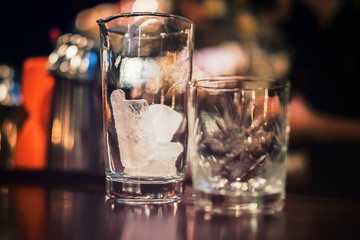 Glass cup crystal silverware cold bar ice transparent bokeh liquid whisky bartending food vodka tequila