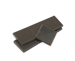 Pieces of dark chocolate isolated