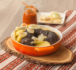 Lunch with ring pudding sausages and potatoes