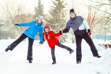 family winter in the snow