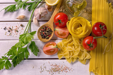 Healthy food, tomatoes and spaghetti lines.