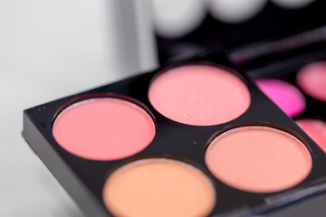 Obraz na płótnie Canvas Backgrounds of Cosmetic makeup set on table.