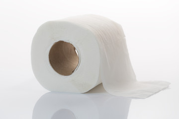 Roll the toilet paper on a white background.