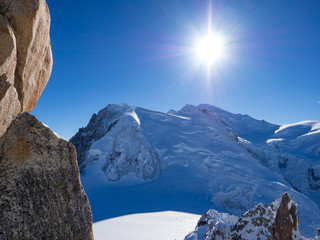 View from Aguille du Midi. France, january 2018. Closel to Mont Blanc, white snow on the mountains and blue sky.