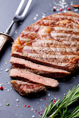 Grilled beef steak Slate stone table. Top view