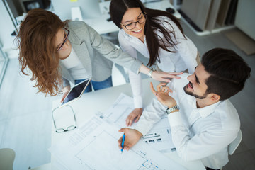 Group of architects working on project