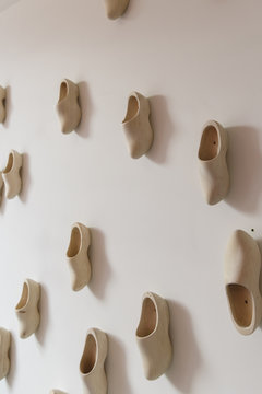 Wooden shoes on the wall of a restaurant in Amsterdam.