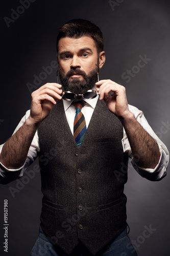 Studio Portrait Of Attractive Handsome Man With Dark Hair