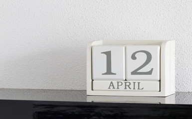 White block calendar present date 12 and month April