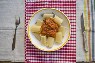 paccheri pasta with tomato sauce and onion