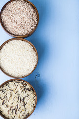 Three bowls with different varieties of rice