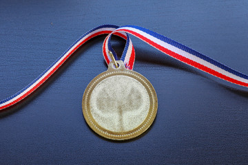 Gold medal and Tricolor ribbon