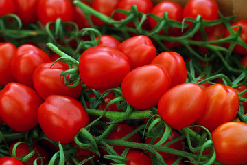 Close up fresh red cherry tomatoes in retail