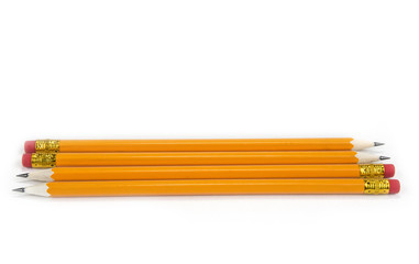 Obraz premium Yellow pencils with eraser on the white background