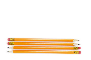Yellow pencils with eraser on the white background