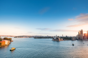 Fototapeta na wymiar Top view Sydney Australia city skyline at circular quay ferry terminal with cloudy blue sky