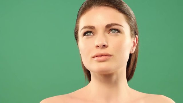 beauty brunette woman on greenback looking up