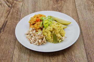 Risotto of two colors on a table