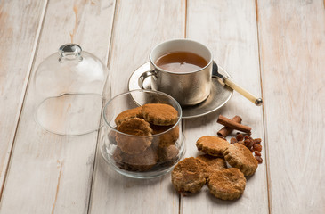 cup of tea with cinnamon cookies