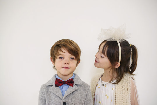 Portrait of a girl looking at a boy