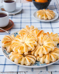 Pineapple ringlets in puff pastry, baked in the form of flowers