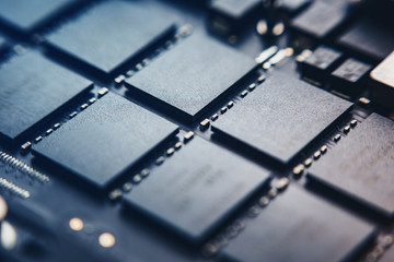 Closeup view to motherboard of modern laptop with chips and othen components