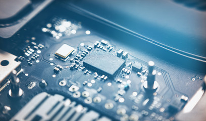 Closeup view to motherboard of modern laptop with chips and othen components