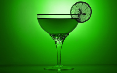 Alcohol cocktail on a colored background.


