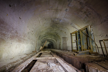 Fototapeta na wymiar Underground abandoned ore mine shaft tunnel gallery electric room