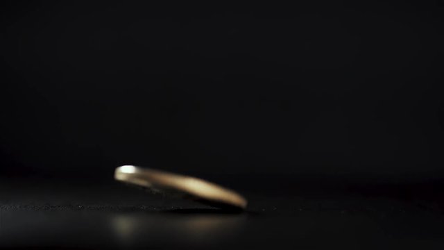 The End of Bitcoin bitcoin gold dropped to dark background slow motion