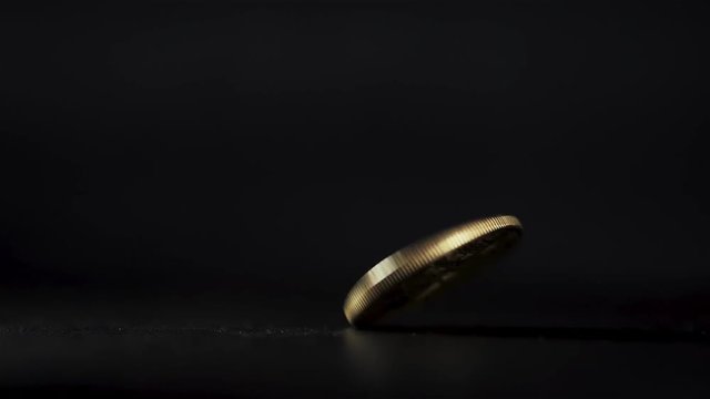 The End of Bitcoin bitcoin gold dropped to dark background slow motion