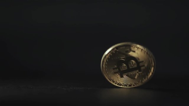 The End of Bitcoin bitcoin gold dropped to dark background slow motion