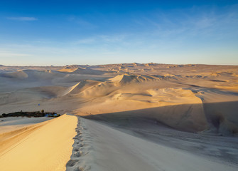 Fototapeta na wymiar Sand Dunes of Ica Desert near Huacachina, sunrise, Ica Region, Peru