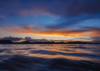 Uros Floating Islands at sunset, Lake Titicaca, Puno Region, Peru