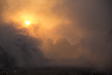Fototapeta premium smoke of burning trash , copy space