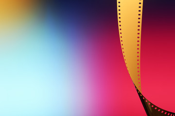 Obraz premium Camera negative film. Selective focus on film perforation. Unprocessed color motion picture film. Industry symbol for shooting process, photochemical laboratory process and film archive technology.