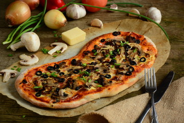 Italian pizza with mozzarella cheese, mushrooms,  black olives and green onion 