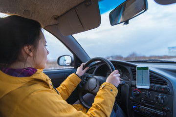 woman drive car in cold winter weather